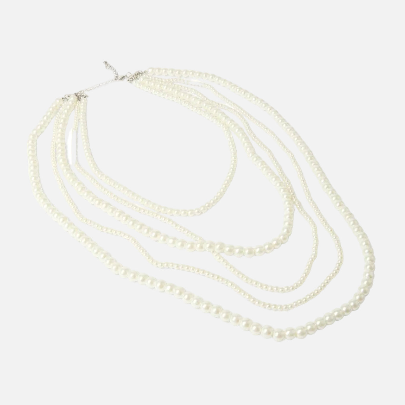 Multi-layered pearl necklace on a white background