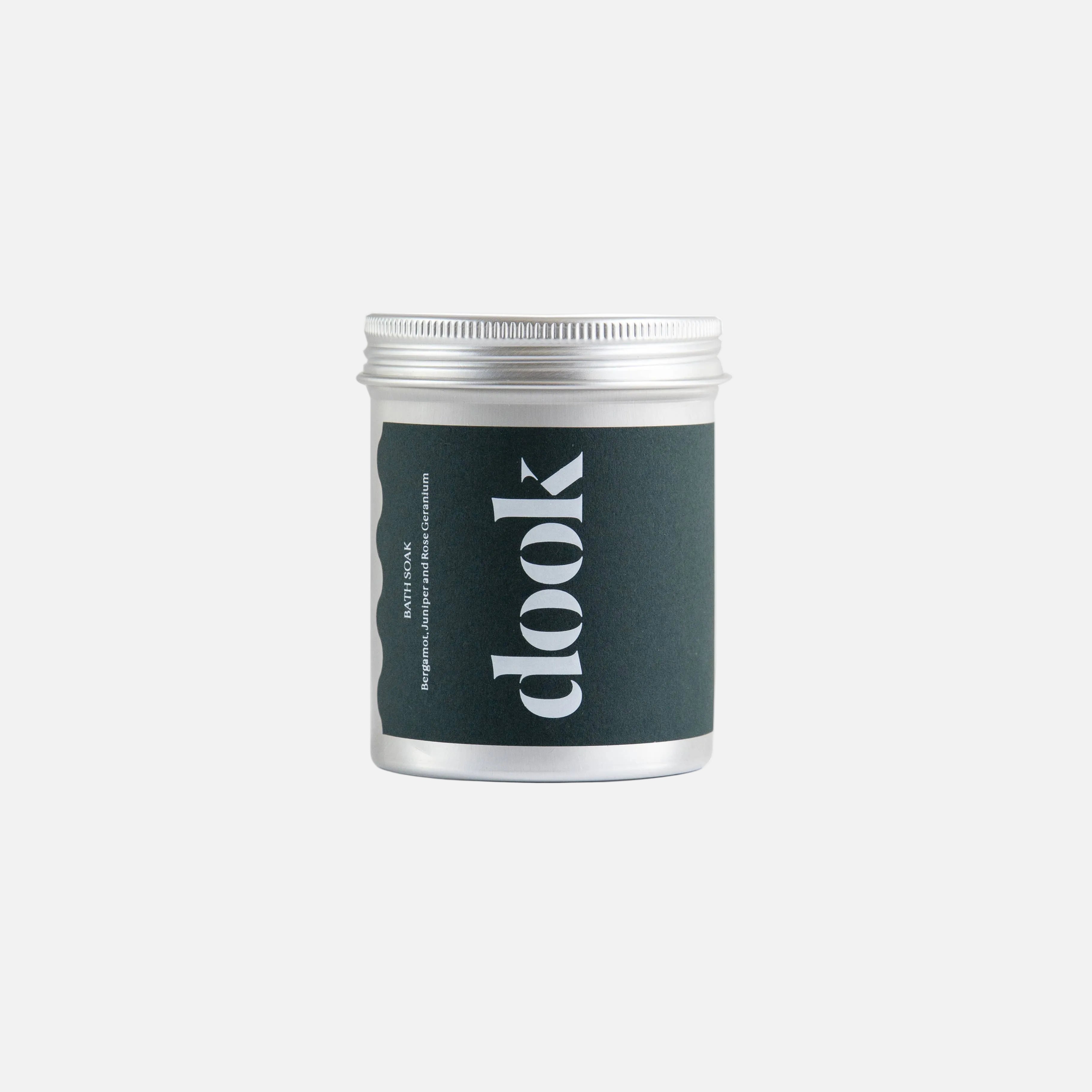 Silver jar with a black label featuring the brand 'dook' on a white background