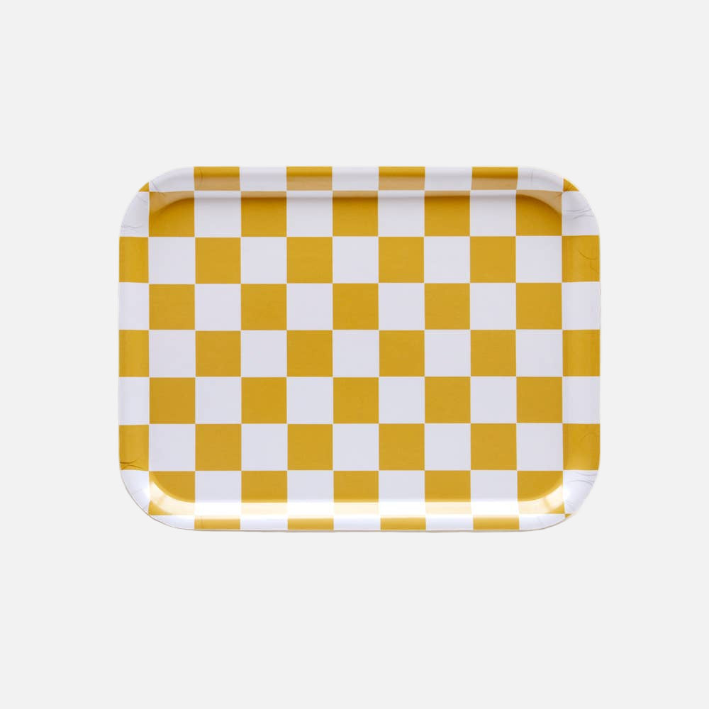 Checkered tray with yellow and white squares on a white background