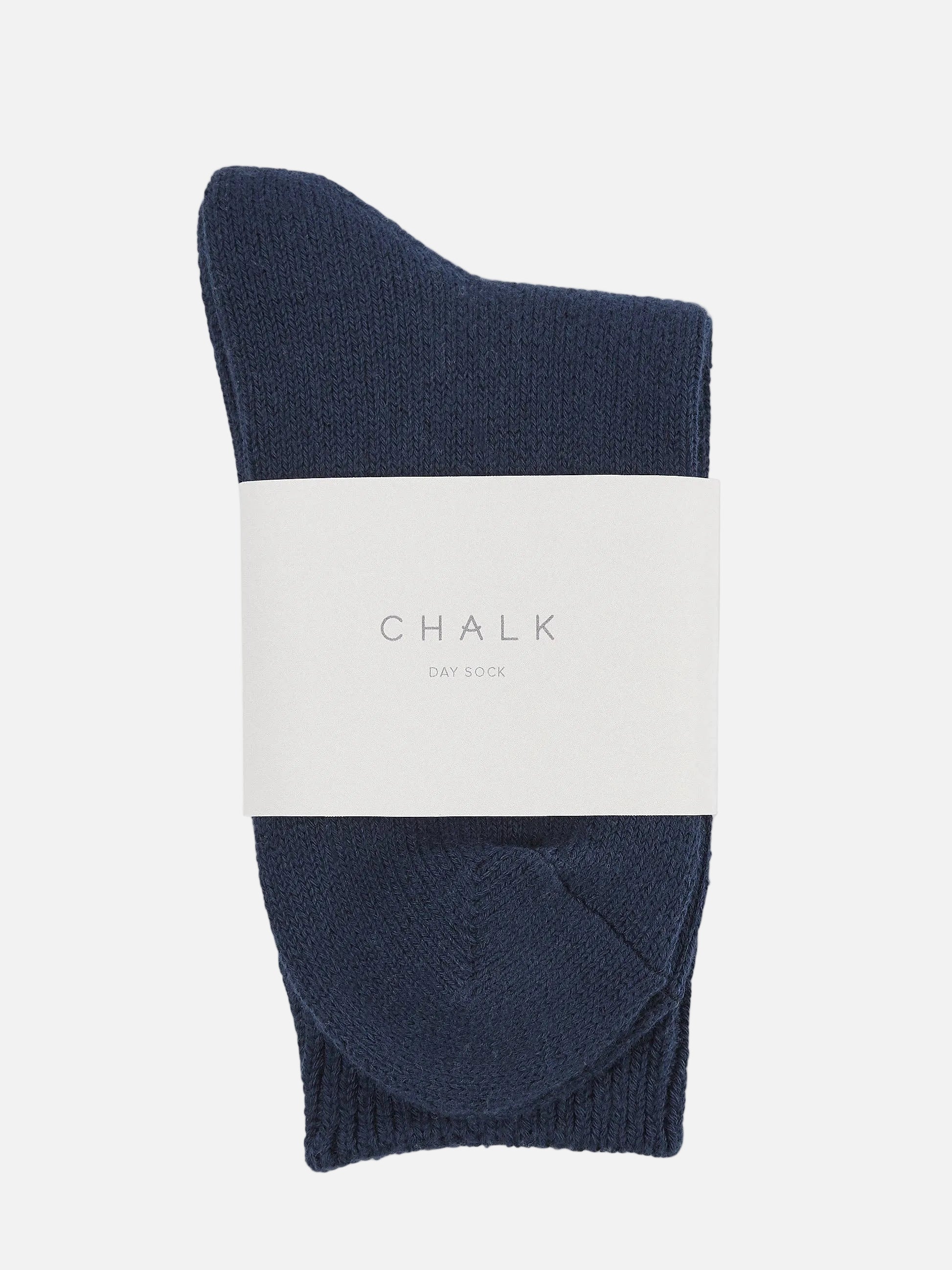 Navy sock with a white label displaying 'CHALK' on a white background
