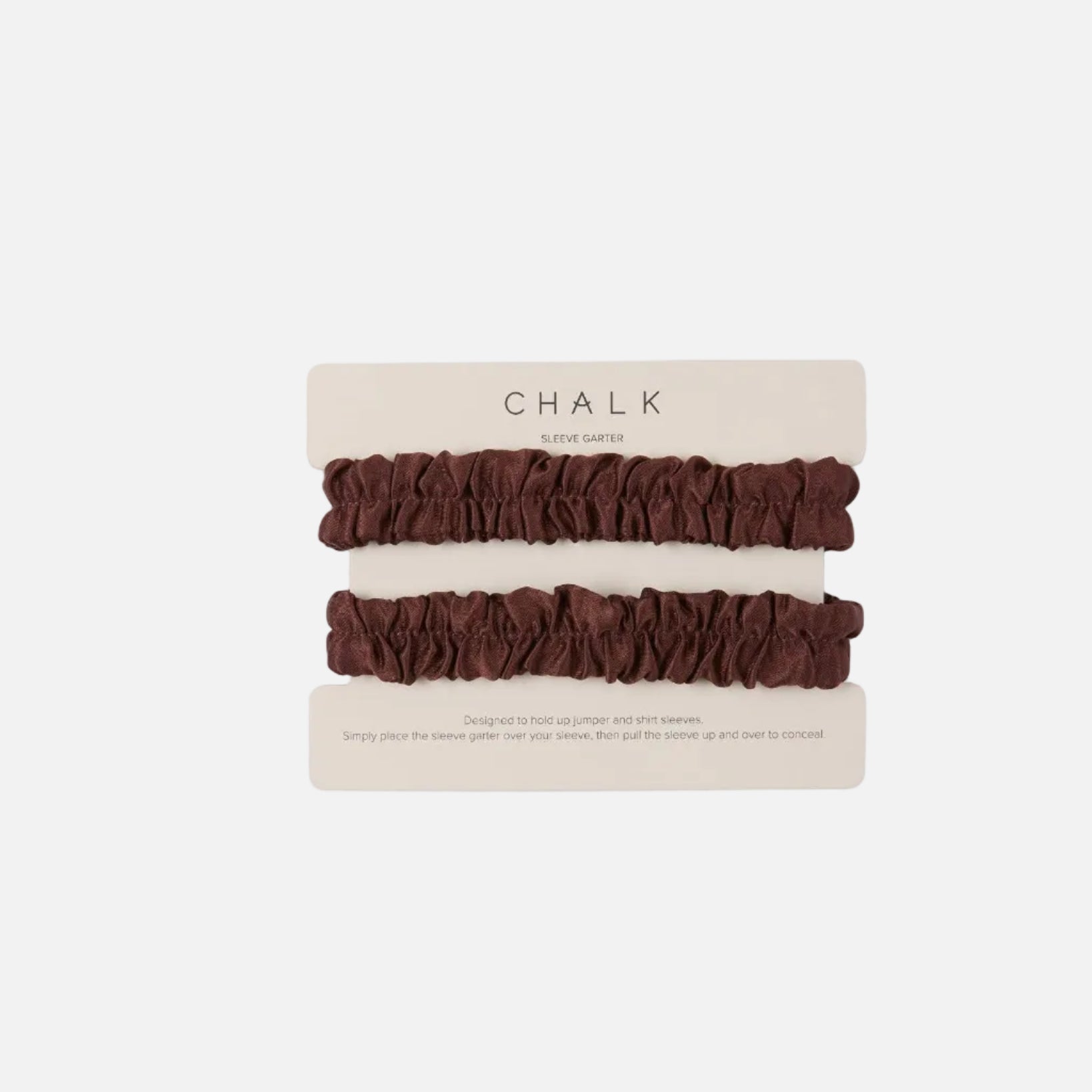 Two dark brown ruffled sleeve garter on a beige card labeled CHALK, photographed on a plain white background.