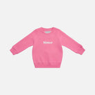 Pink sweatshirt with 'Sister' text on a white background
