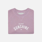 Folded lilac sweatshirt