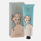 Divine hand cream with packaging featuring illustrations of a woman's face.