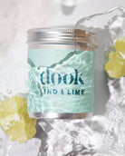 Jar of 'dook' product with 'Lind & Lime' label on a textured white background