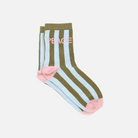 Striped socks with 'PEACE' text on a light gray background