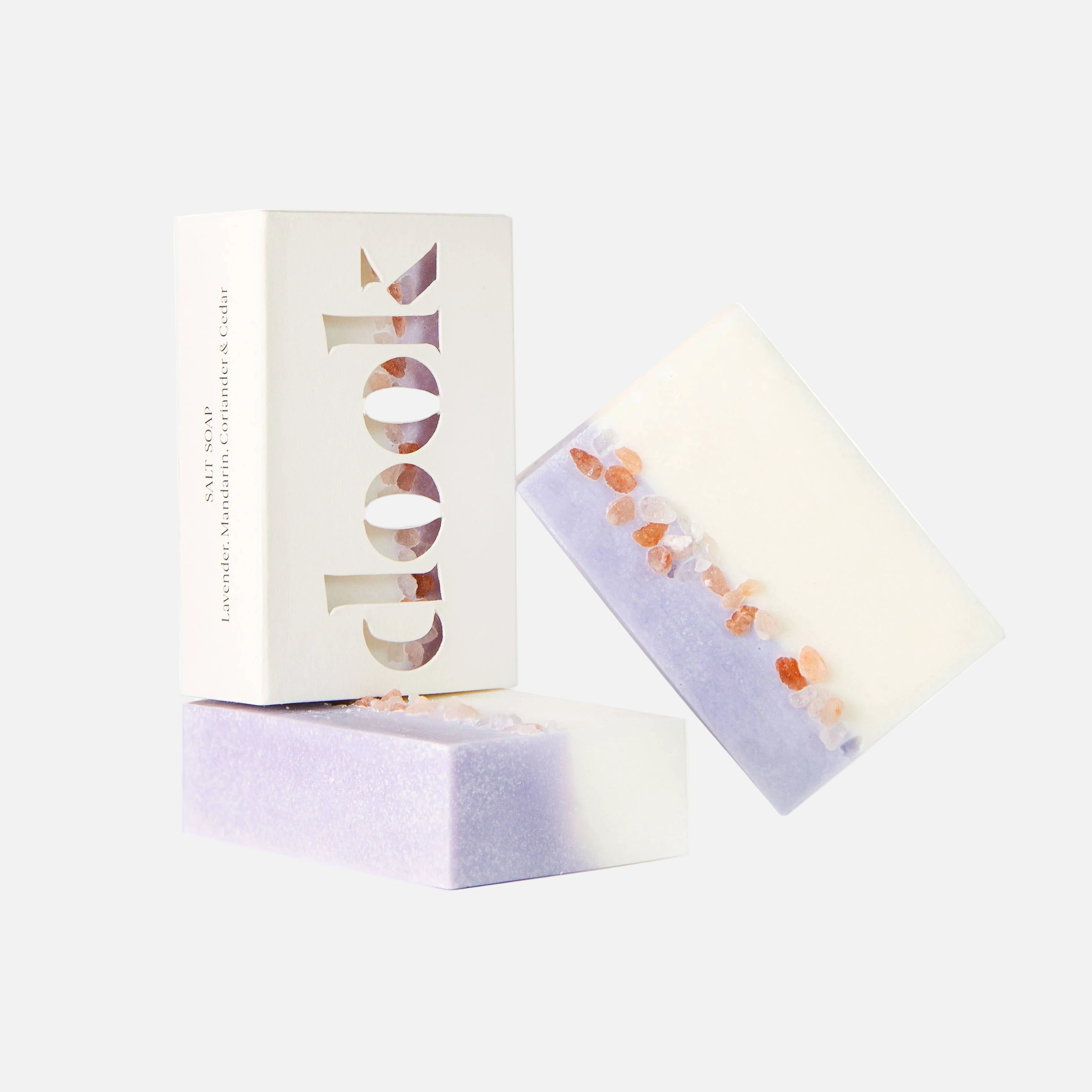 Bar of soap with a decorative box on a white background