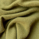 Close-up of greenmerino wool scarf with a textured pattern