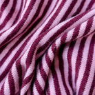 Close-up of pink striped merino wool scarf